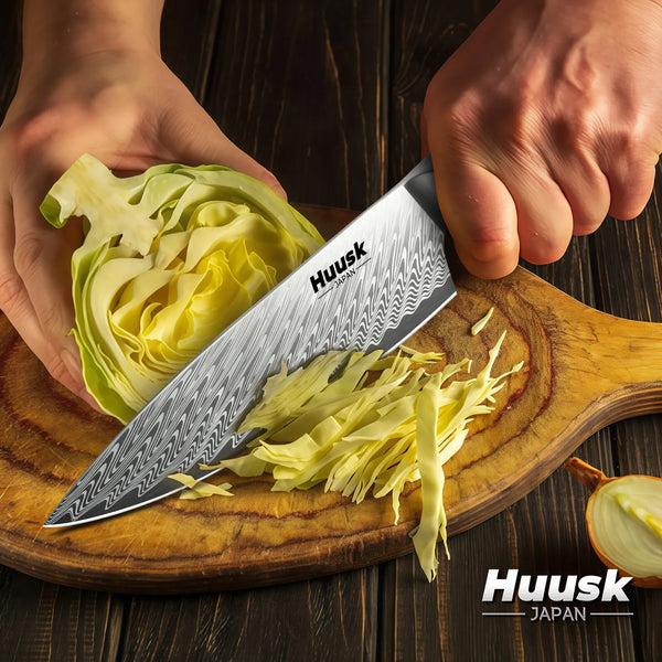 Damascus steel blade with distinctive wave pattern and mosaic handle design