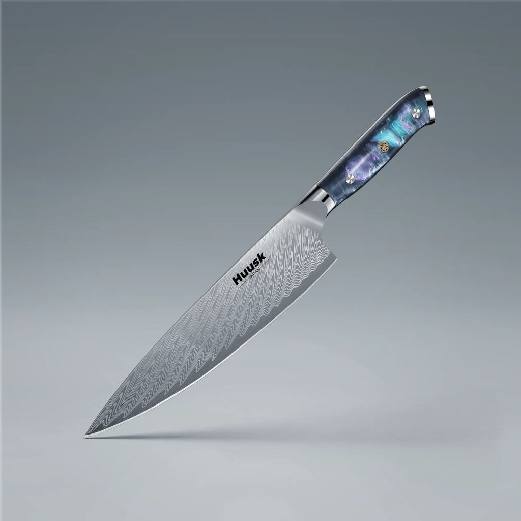8-inch Damascus steel chef knife with blue resin handle and protective sheath
