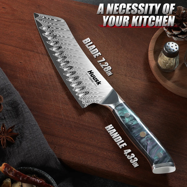 Close-up of Damascus steel Granton edge blade pattern