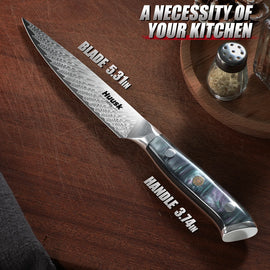 Close-up of Damascus steel blade pattern and sharp edge