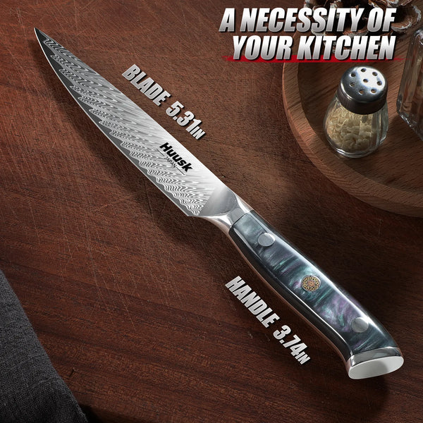 Close-up of Damascus steel blade pattern and sharp edge