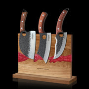 ember-red double-sided magnetic knife block holding three kitchen knives
