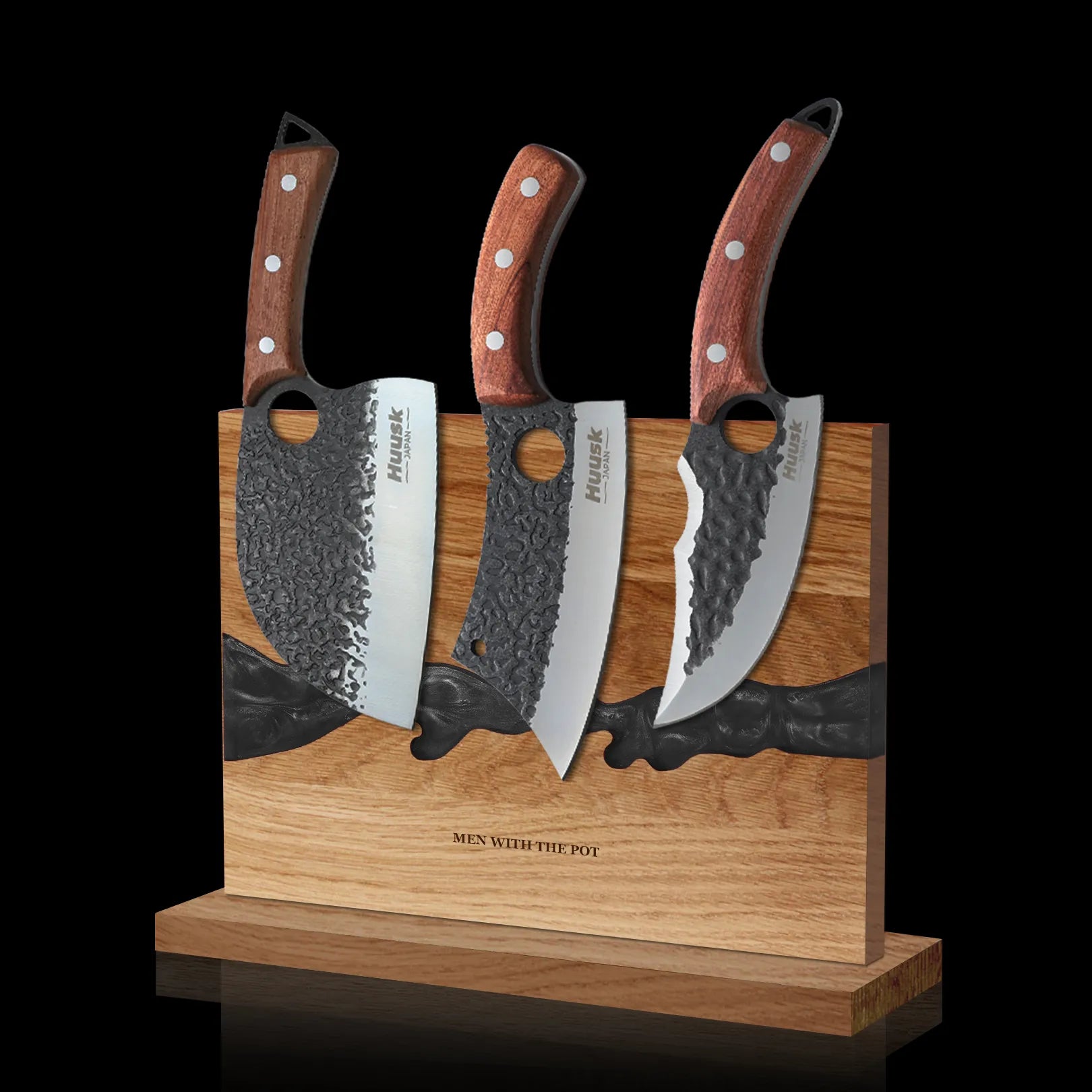 obsidian-black double-sided magnetic knife block holding three kitchen knives