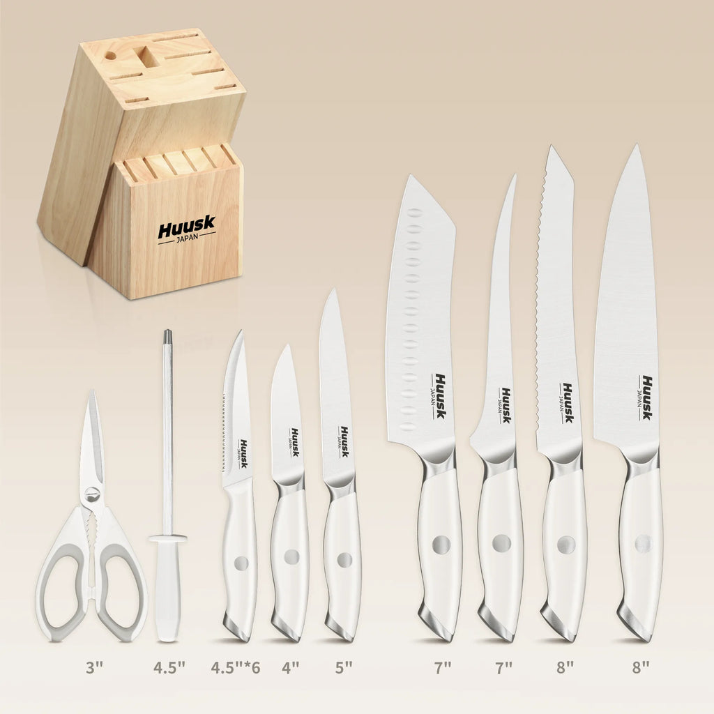 Huusk kitchen knife set contents showing steak knives, kitchen knives, kitchen shears, sharpening rod, and wooden block