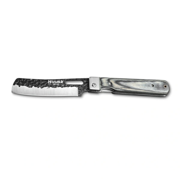 Huusk camo folding cleaver fully open in a side view on white.
