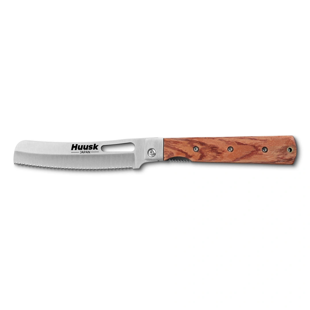 Huusk natural wood folding bread knife fully open in a side view on white.