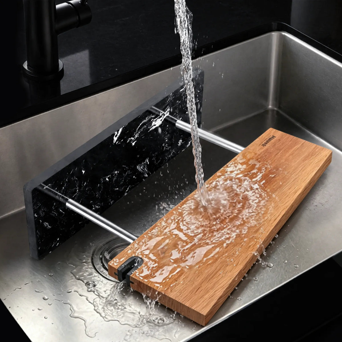 Removable parts of the marble-base magnetic knife stand being rinsed