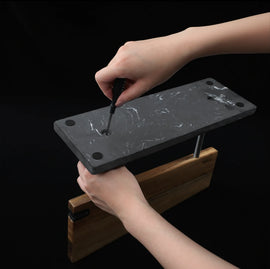 Anti-slip feet and assembly points under the marble knife stand base